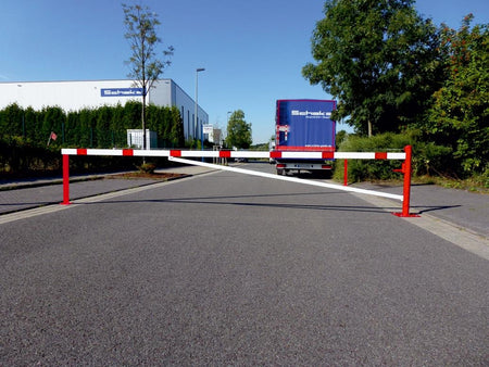 Swing barrier with bracing tube and pull rope reinforcement for casting in concrete